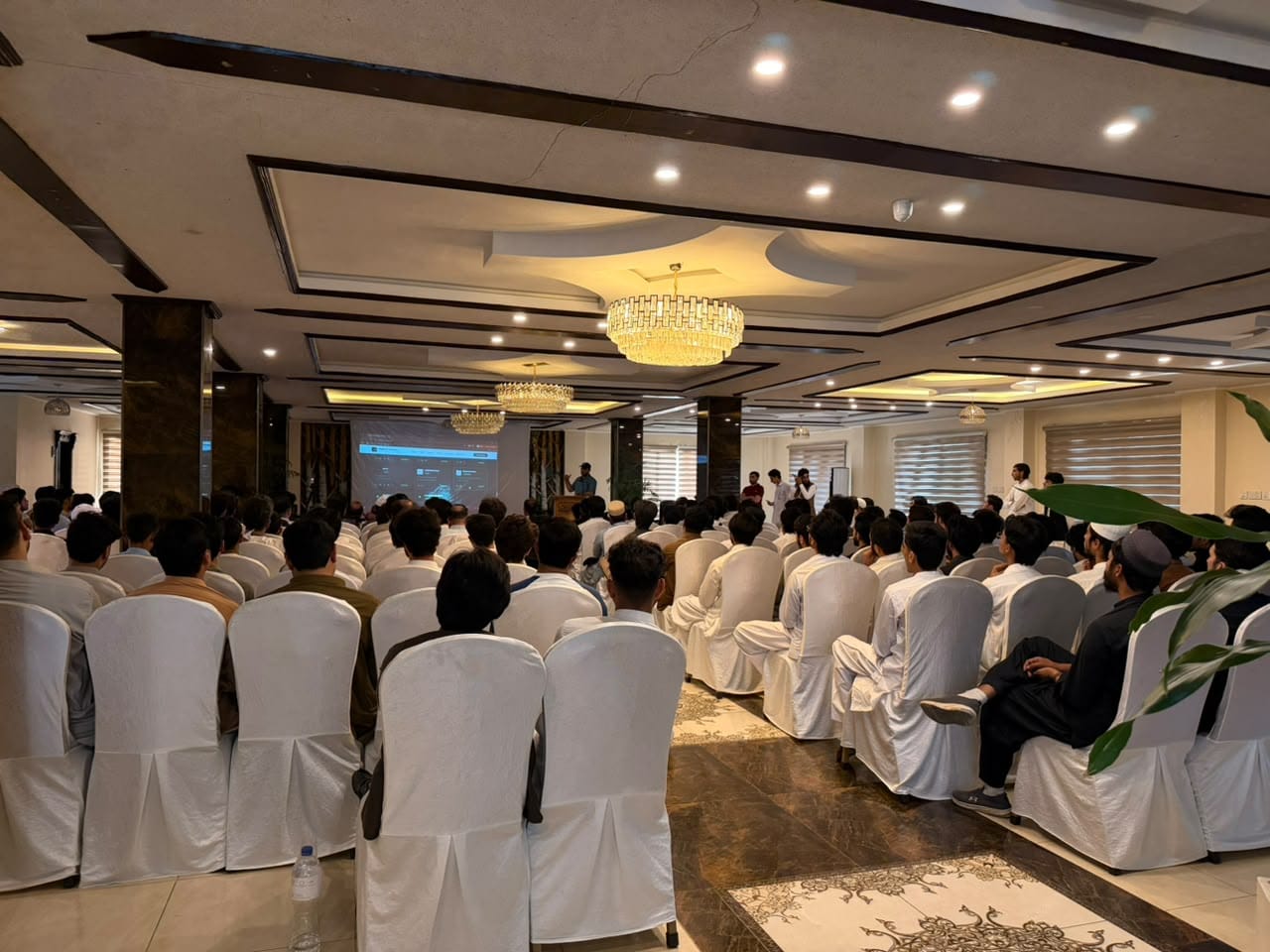 Packed banquet hall at the Digital KP Network meetup at Swat Palace